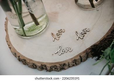 Rustic Wedding Reception Top Table Seating With Glasses, Cutlery And Dishes