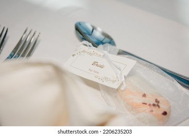 Rustic Wedding Reception Top Table Seating With Glasses, Cutlery And Dishes