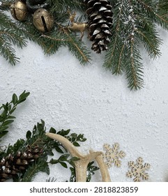 Rustic Winter Christmas Flat Lay With Evergreen Branches, Pinecones And Antlers On White Background 