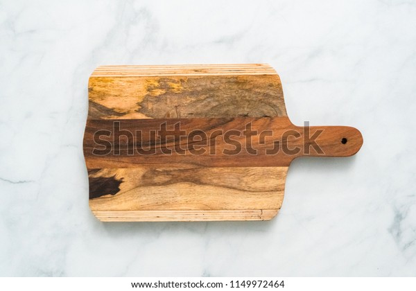 Rustic Wood Cutting Board On Marble Stock Photo Edit Now 1149972464