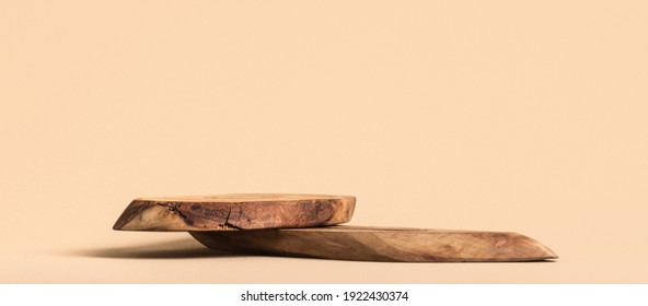 Rustic wood pieces podium. Background for perfume, jewellery and cosmetic products. Front view. - Shutterstock ID 1922430374