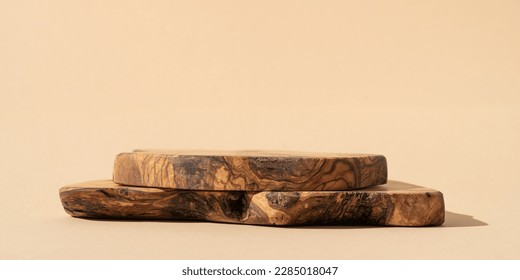 Rustic wood podium on beige background. Minimal mockup background for product presentation. Wood board for food, products or jewelry.	
 - Shutterstock ID 2285018047