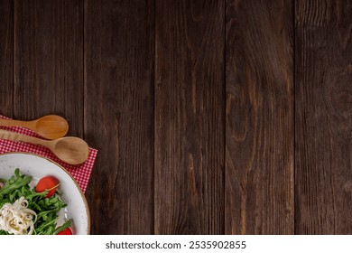 Rustic wooden background with dark brown tones. The background features a natural wood texture, enhancing the brown color and rustic style. Food on wooden table background. Rustic wood background.