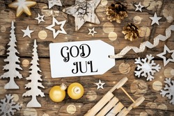 Rustic Wooden Bokeh Christmas Background, Winter Decoration With Label With Swedish Text God Jul, Which Means Merry Christmas In English