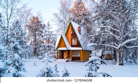  Rustic wooden house in the snow-covered forest. Ural, Russia. - Powered by Shutterstock