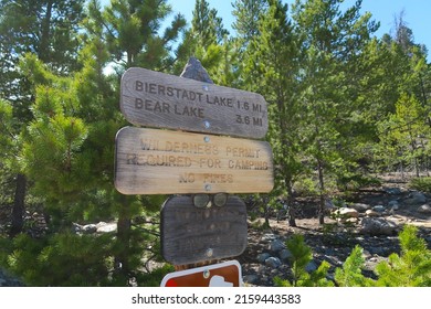 Rustic Wooden Sign For Bierstadt Lake Trail At Rocky Mountain National Park. Wilderness Permit Required For Camping. No Fires. No Horses Beyond This Point.