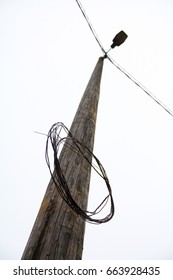 Rustic Wooden Streetlight Pole