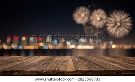 A rustic wooden table in the foreground with a blurred background of city lights and a vibrant fireworks display illuminating the night sky.