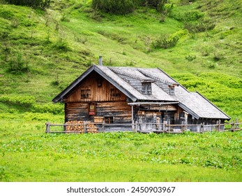 A rustically wooden shed at the Bavarian mountains  - Powered by Shutterstock