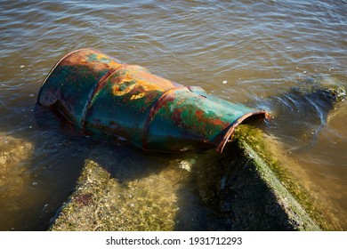 Rusting 50 Gallon Drum Dumped At The Ocean Side Close Up