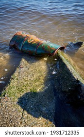 Rusting 50 Gallon Drum Dumped At The Ocean Side, Wide View