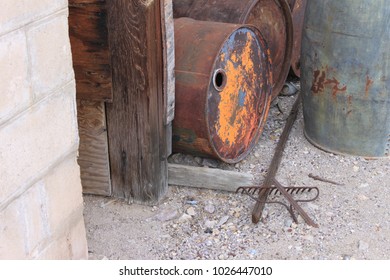 Rusty 50 Gallon Drum Outside Old Building