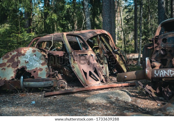 Rusty abandoned cars, car\
graveyard