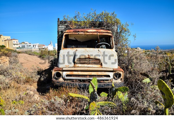Rusty Abandoned Truck on the Desert, in Canary\
Islands, Spain