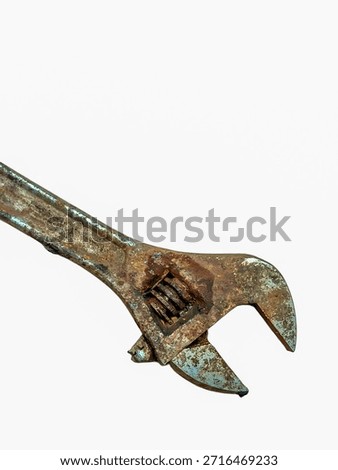 Rusty Adjustable Spanner Isolated on White Background 