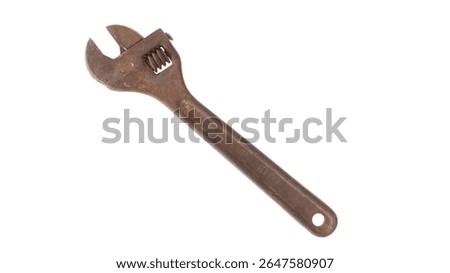 Rusty adjustable wrench on white