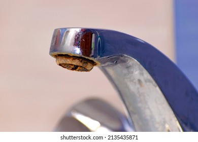 Rusty Aerator Of The Sink Mixer. Close-up. Selective Focus