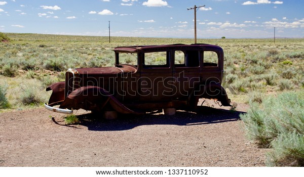 Rusty Antique Car       \
             