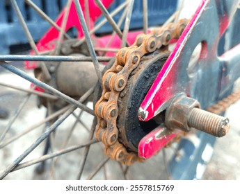 a rusty bicycle chain attached to the rear bicycle gear - Powered by Shutterstock