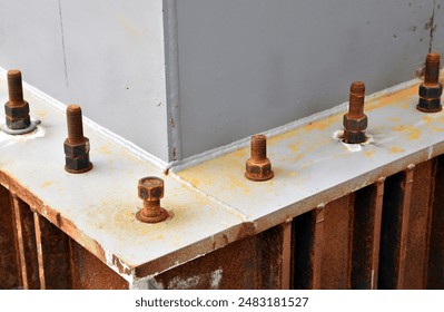 rusty bolt and nut to support base structure of metal post  maintenance of pole structure of large building, hardware for heavy construction industrial - Powered by Shutterstock