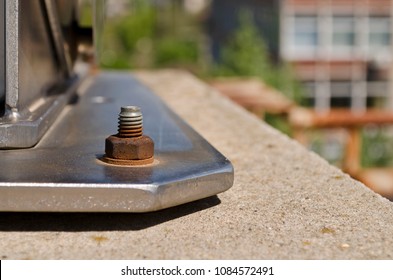 Rusty Bolt In Weathered Nut Outside