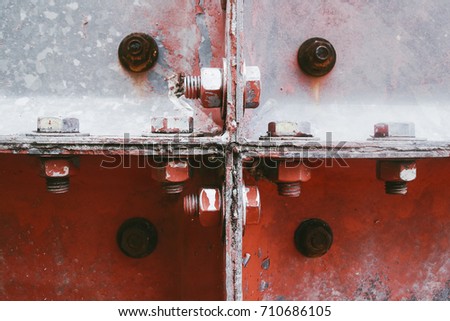 Rusty bolts and nuts on an old machinery