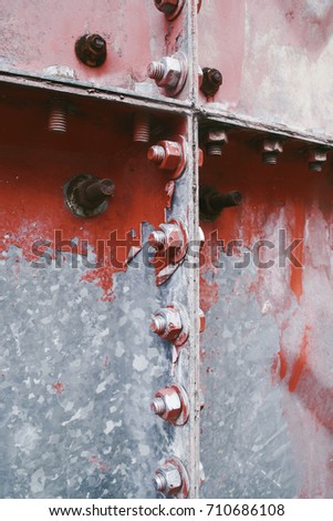 Rusty bolts and nuts on an old machinery