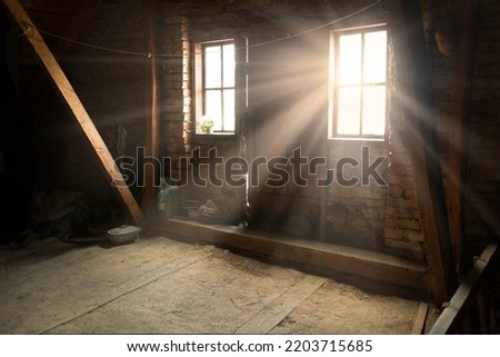 Rusty brown creepy scary past age big empty farm under roof lodge wall dim hole shine glow lit white day sky sun beam ray view scene. Dusty city ruin ceil messy cellar floor text space shadow backdrop