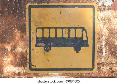 Rusty bus stop sign