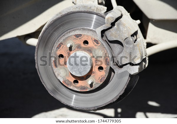 rusty car brake disc caliper, brake disc\
replacement, auto parts, auto\
repair