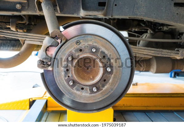 rusty car disc drum\
brake without wheel