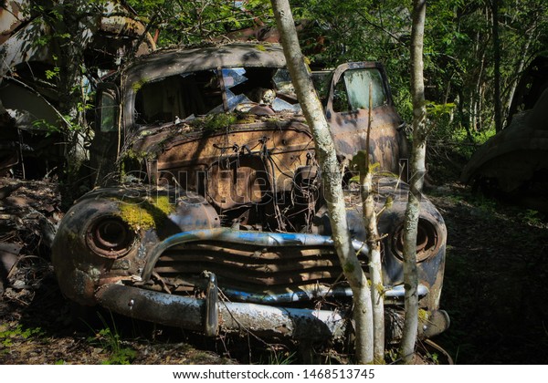 Rusty Car Graveyard in\
Sweden