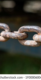 Rusty Chain From Agricultural Machinery With Dark Background