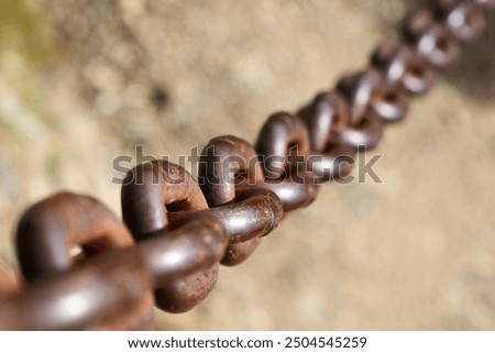 Rusty chain close-up, selective focus, shallow depth of field