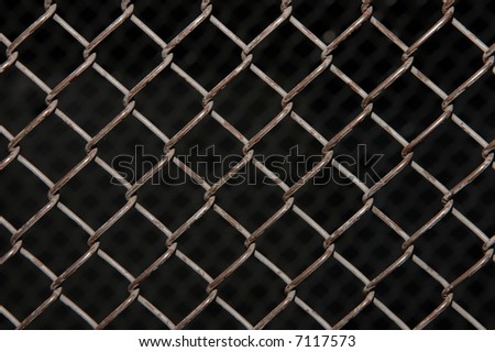 Rusty chain link on black