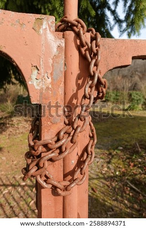 Rusty Chain Wrapped Around Gate