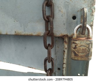 Rusty Chains And Locks Are Out Of Focus And Too Bright