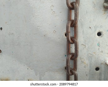 Rusty Chains And Locks Are Out Of Focus And Too Bright