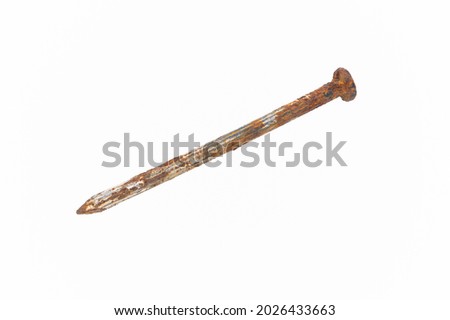 rusty concrete nails on white background closeup