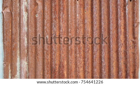 Rusty corrogated metal.