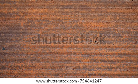 Rusty corrogated metal.