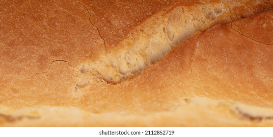 Rusty Crust Of Bread As A Background. Texture