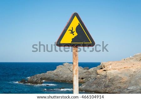Rusty Danger Cliff Sign in Cabo de Palos - La Manga, Cartagena and San Javier, Murcia, Spain, Europe
