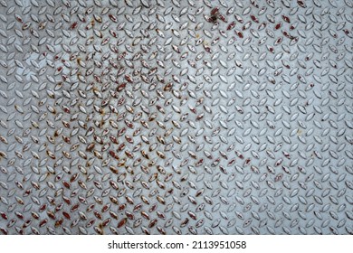 Rusty Diamond Steel Plate Texture Background.