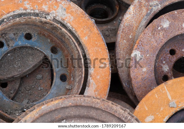 Rusty Disc Brakes in a Junk\
Pile