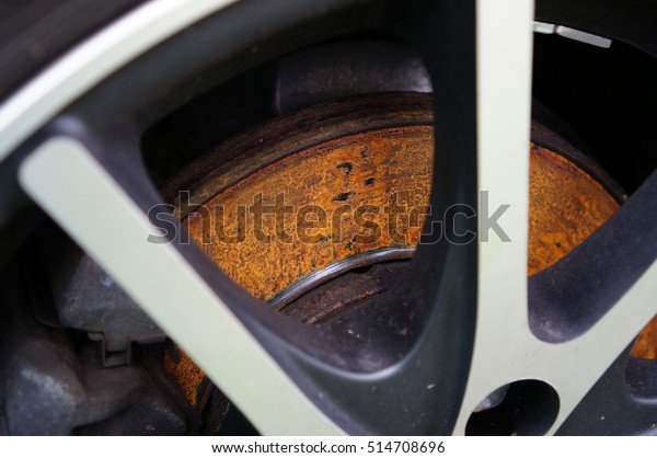 Rusty\
disk brake system on the car. Disk brake\
problem
