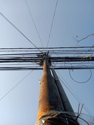 Rusty Electricity Poles With Tangled Wires