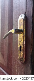 Rusty And Faded Gold Doorknob