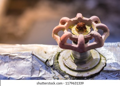 Rusty Gate Valve Of Water Heater Pipe, Texture Of Rust With Blur Background.