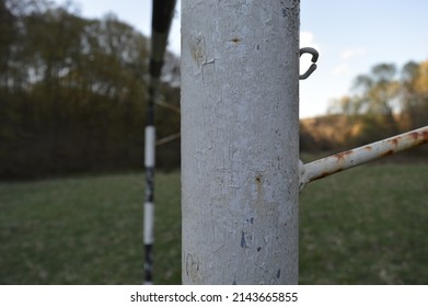 A rusty goalpost at an abandoned football pitch